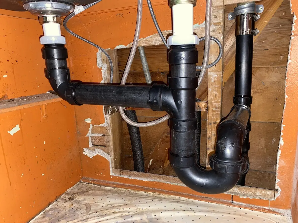 Professional Garbage Disposal Repair equipment and tools on the job in Masontown